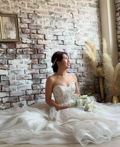 座ったポージング