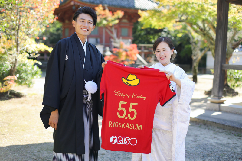 ユニフォームを持って