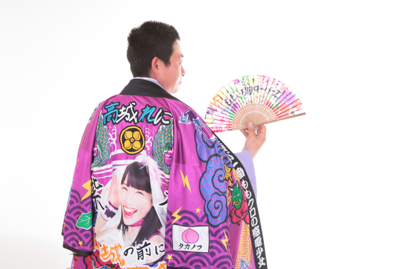 男は背中で語る