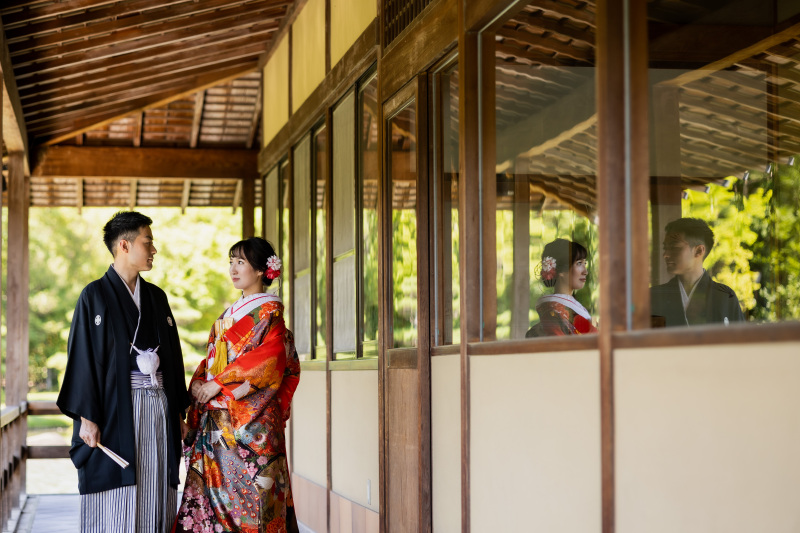 ガラスに反射するお二人