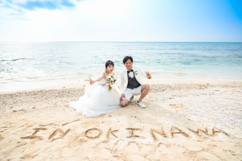 砂浜に文字を書いて