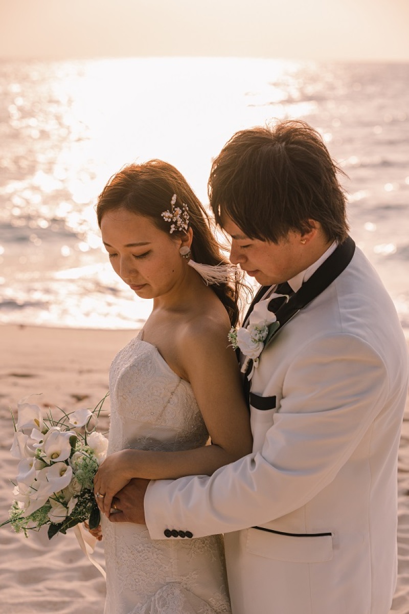 太陽がとっても綺麗に光っている海を背景に♪