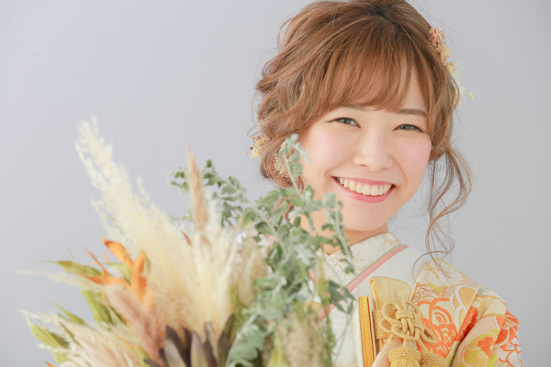 素敵な笑顔とブーケで