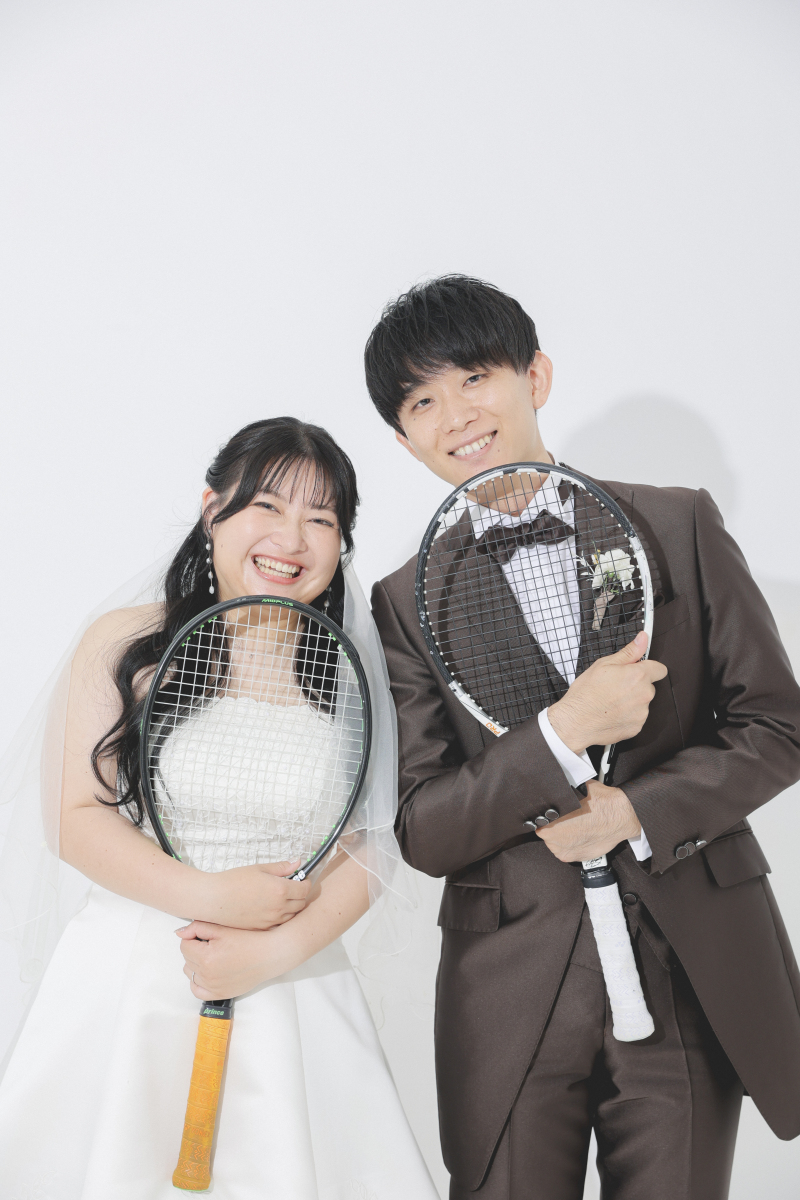 ラケットを手に