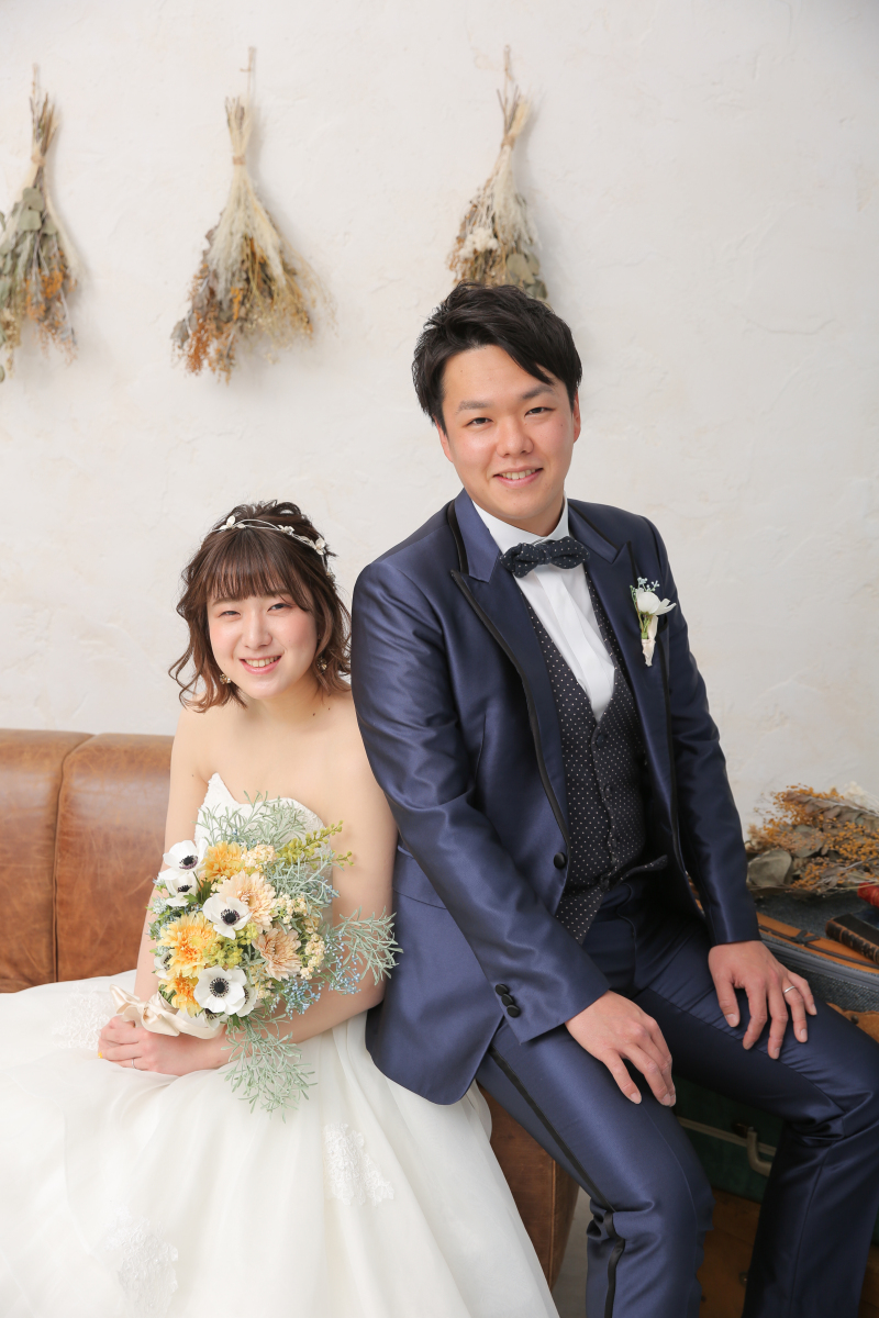 背景を生かしたポージングも