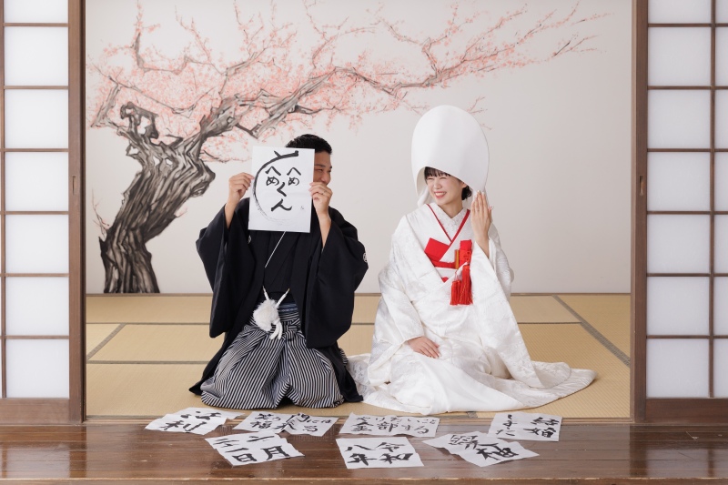 書道を飾って、綿帽子姿のご挨拶