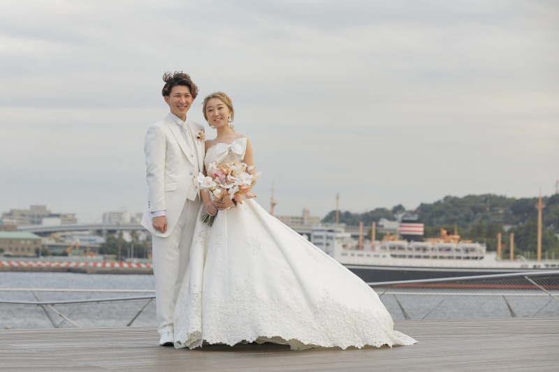 強風にも負けない笑顔