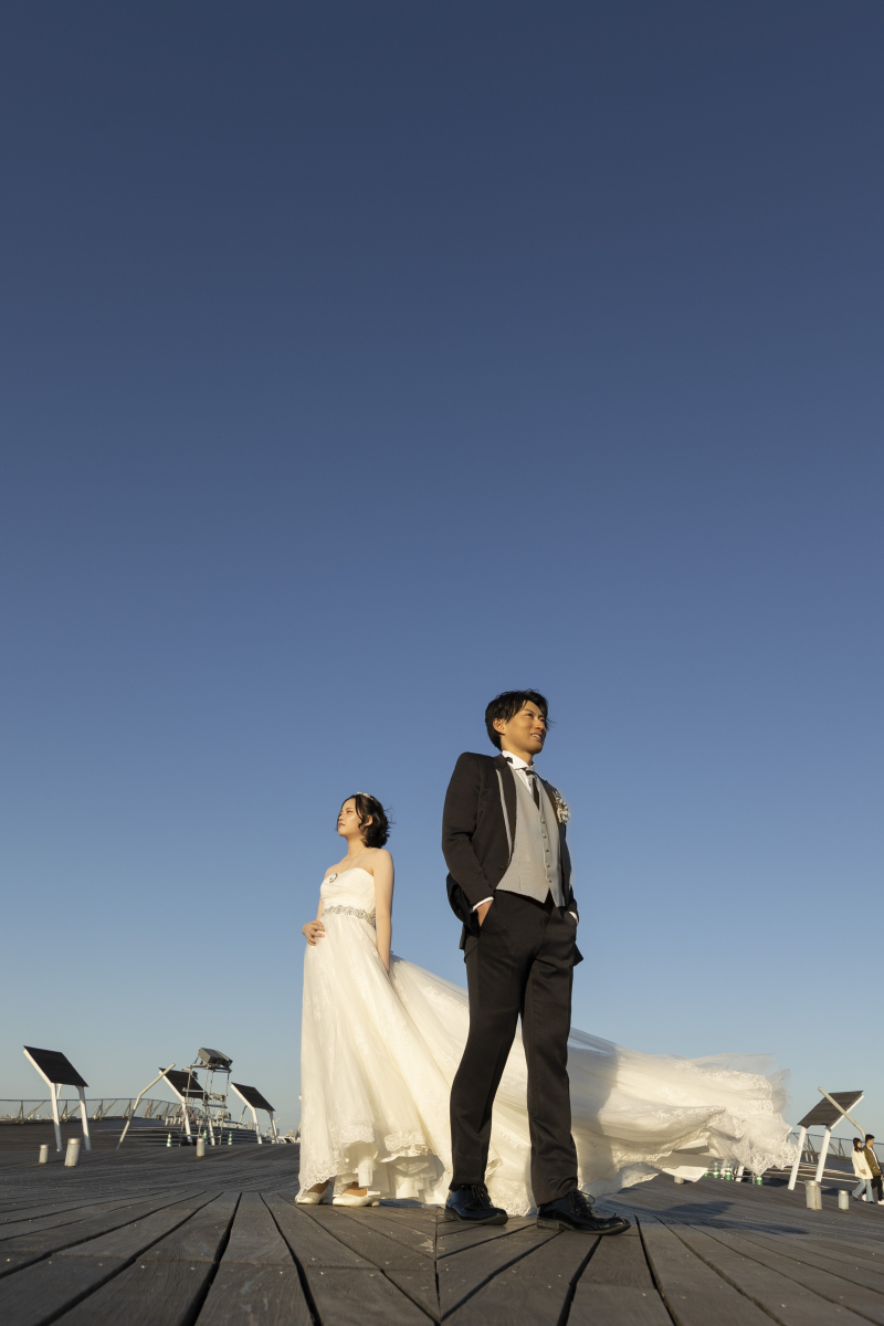 背中合わせでも