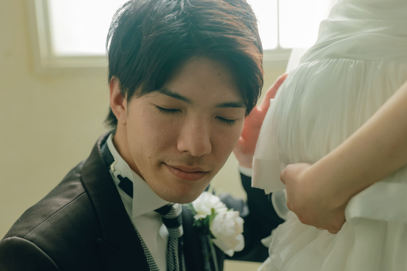 優しい表情の新郎様