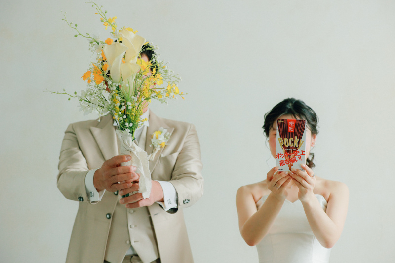 お二人のアイディアが光るブーケを使ったカット。