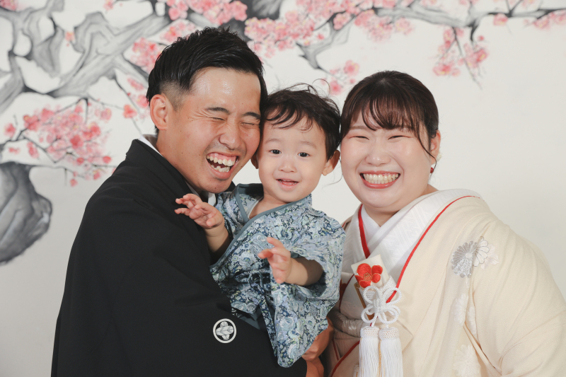 お子様と満面の笑みで