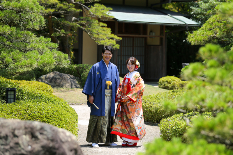 爽やかなネイビーの袴とオレンジの打掛で