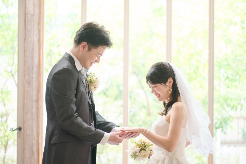 指輪交換シーンも笑顔で^^