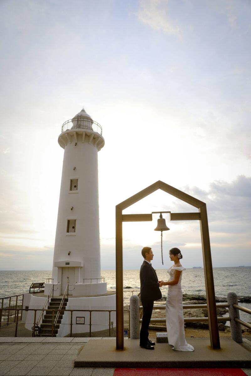 灯台の下で誓う