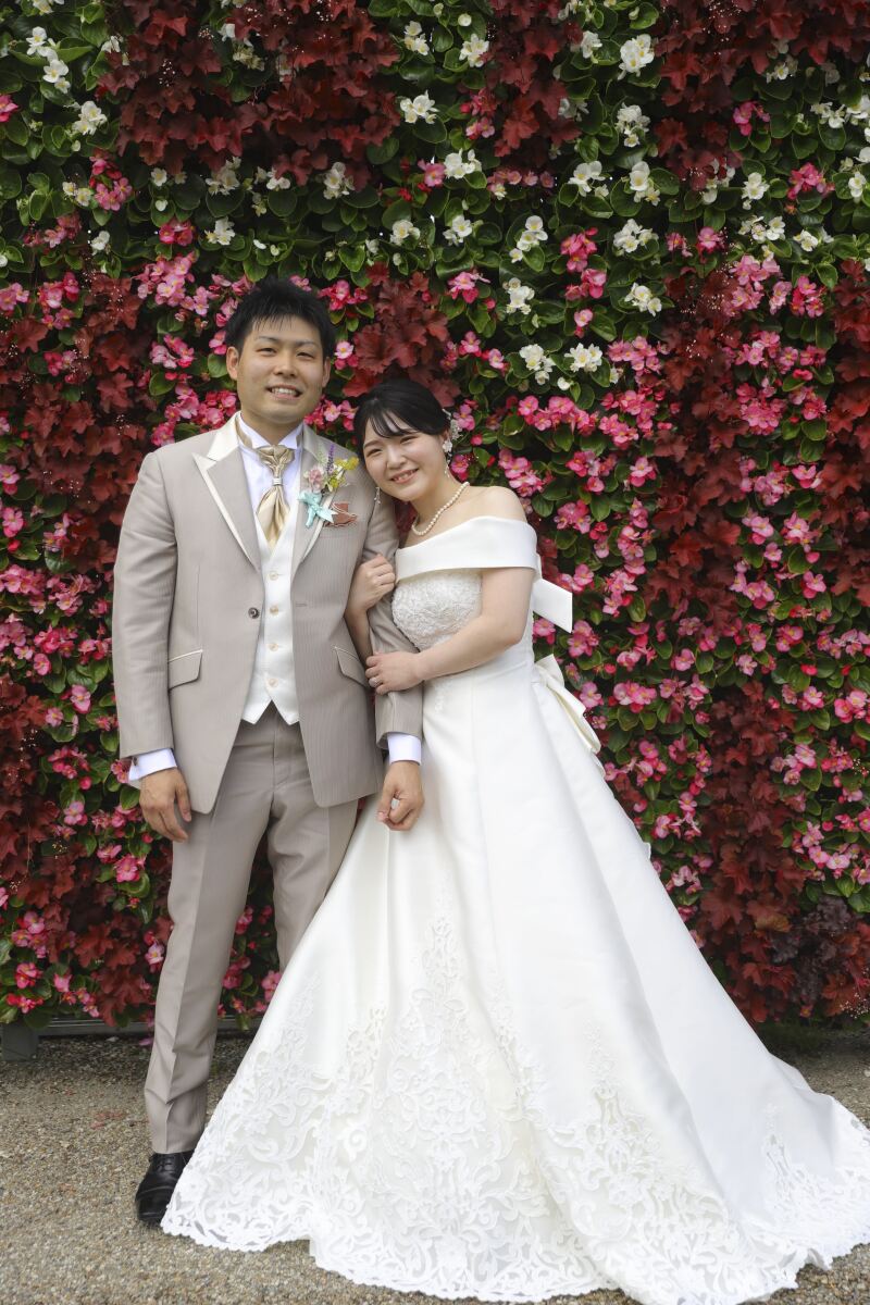 入口にあった花が一面に敷き詰められた花壁前にて