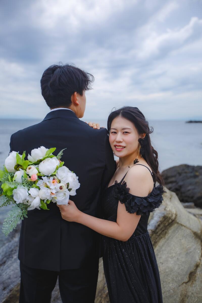 ご新郎様の 背中に 愛を 託して