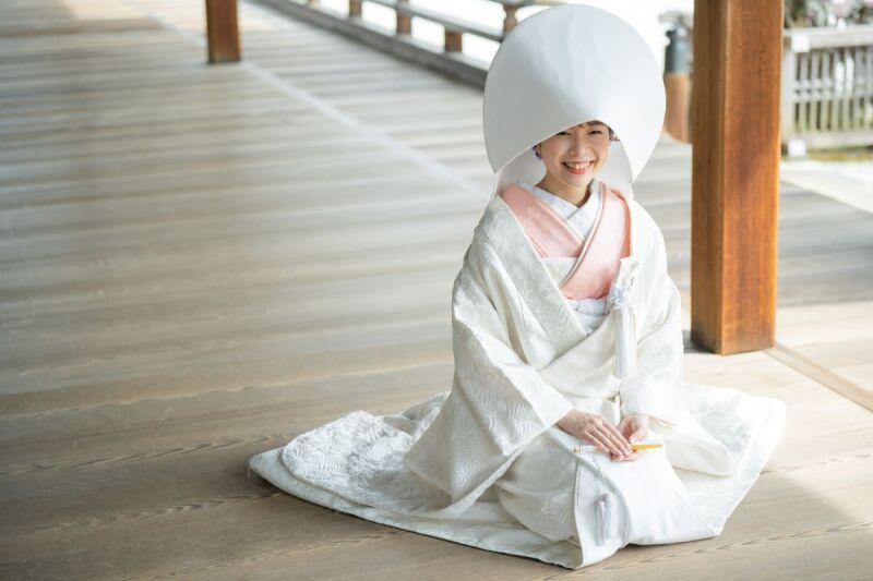 ちらりと覗く微笑み