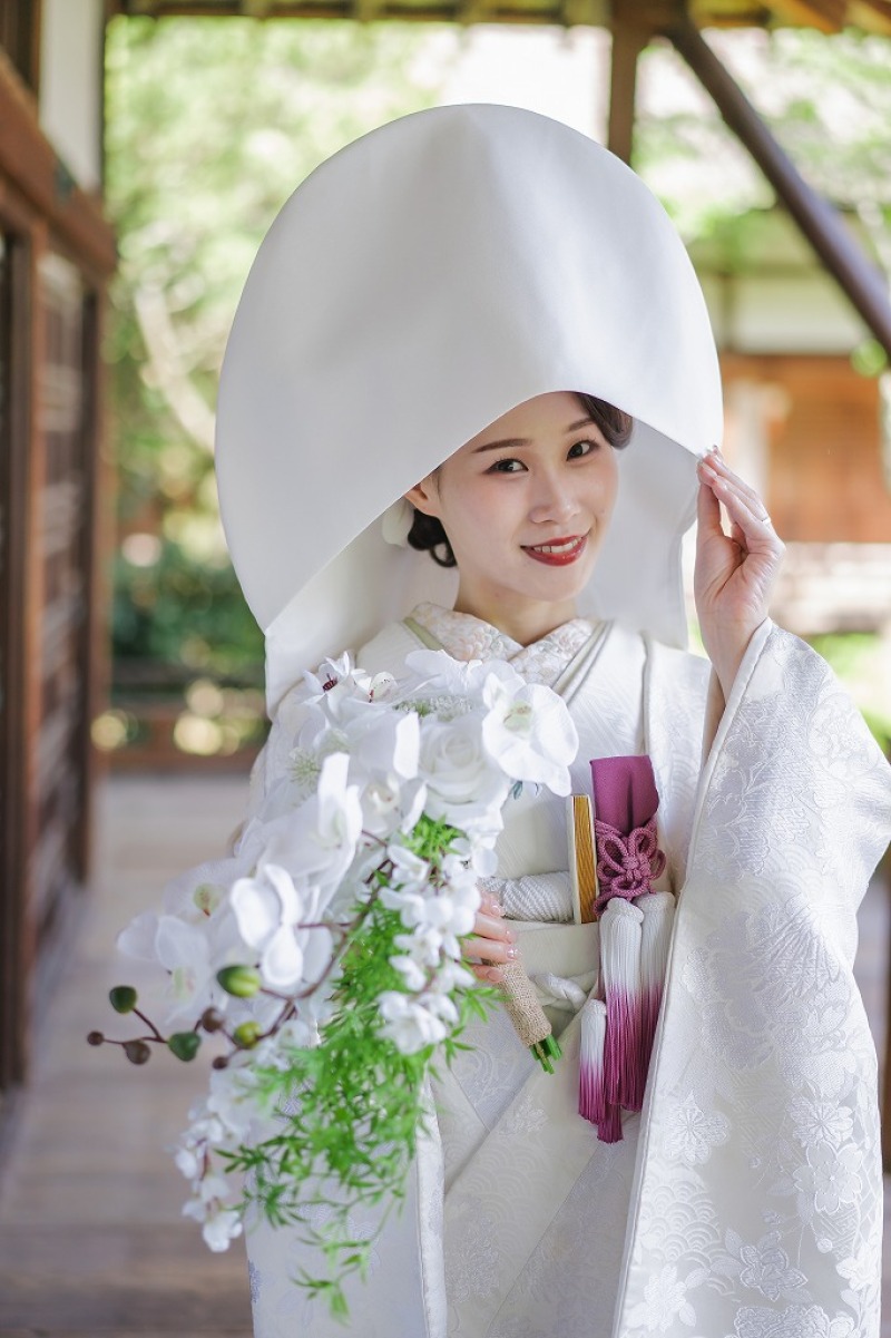 綿帽子を被って