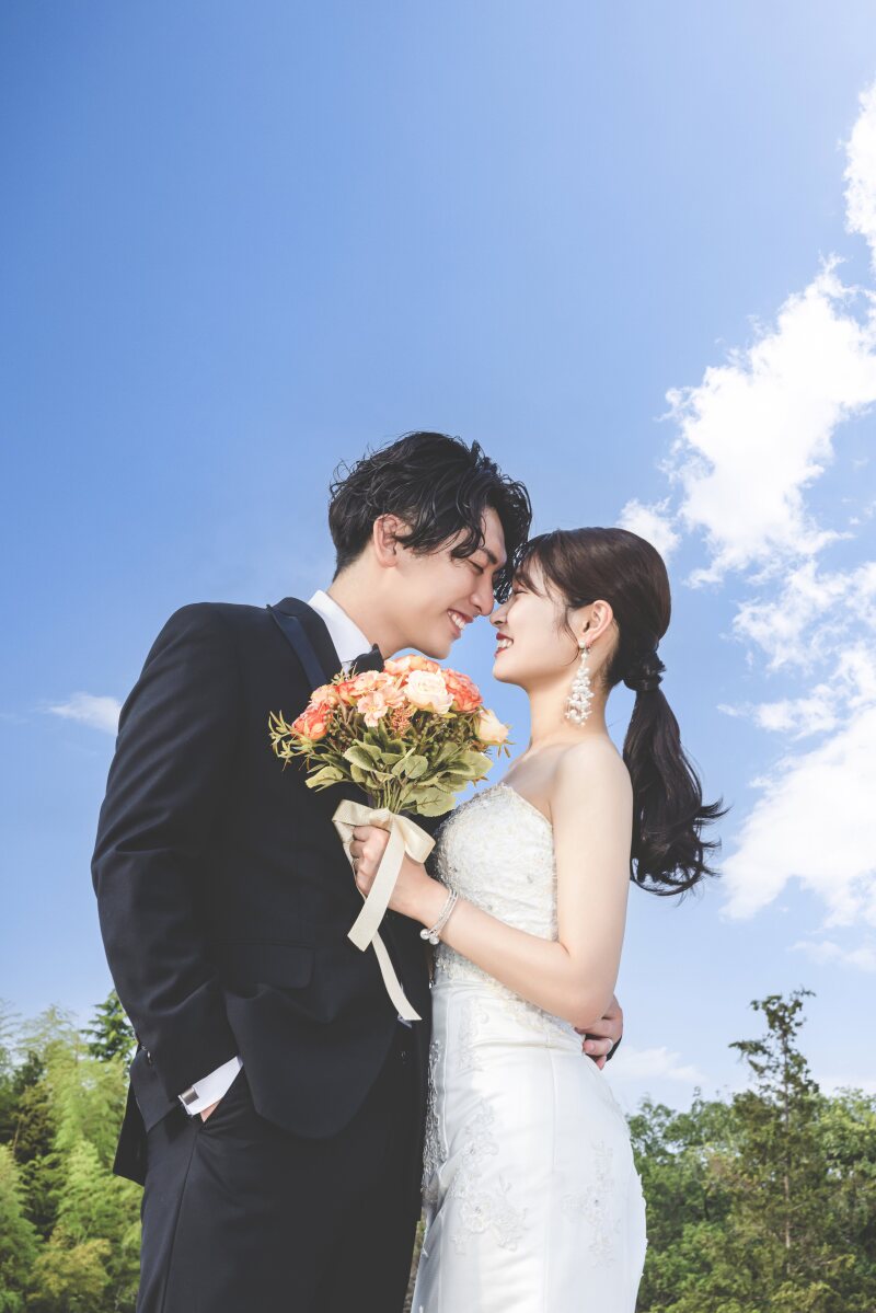 空と笑顔がリンクする瞬間。