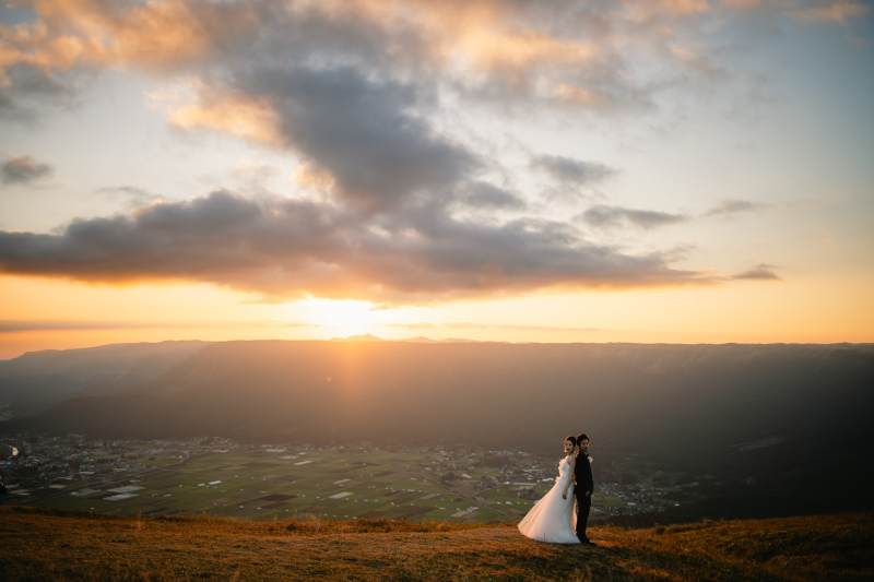 雄大な阿蘇の山々と共に