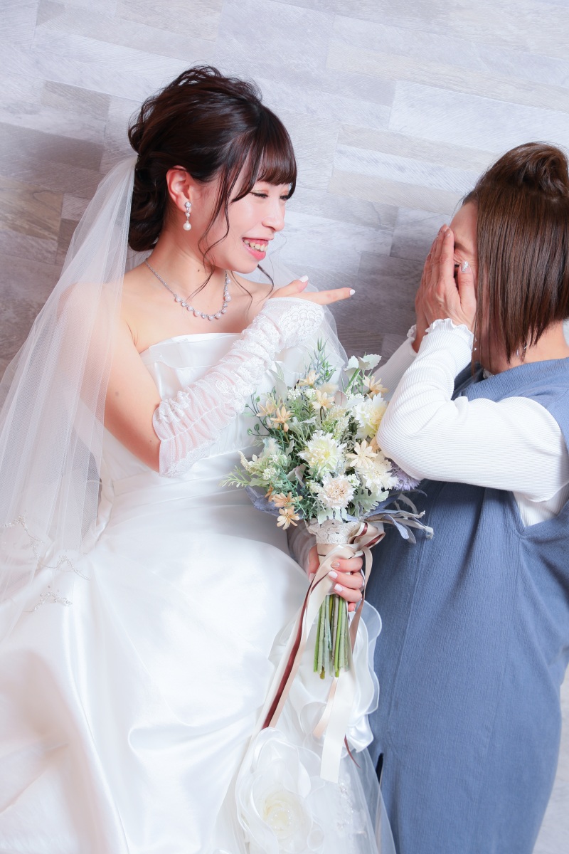 お嬢様の花嫁姿をご覧になってお母様もこの表情