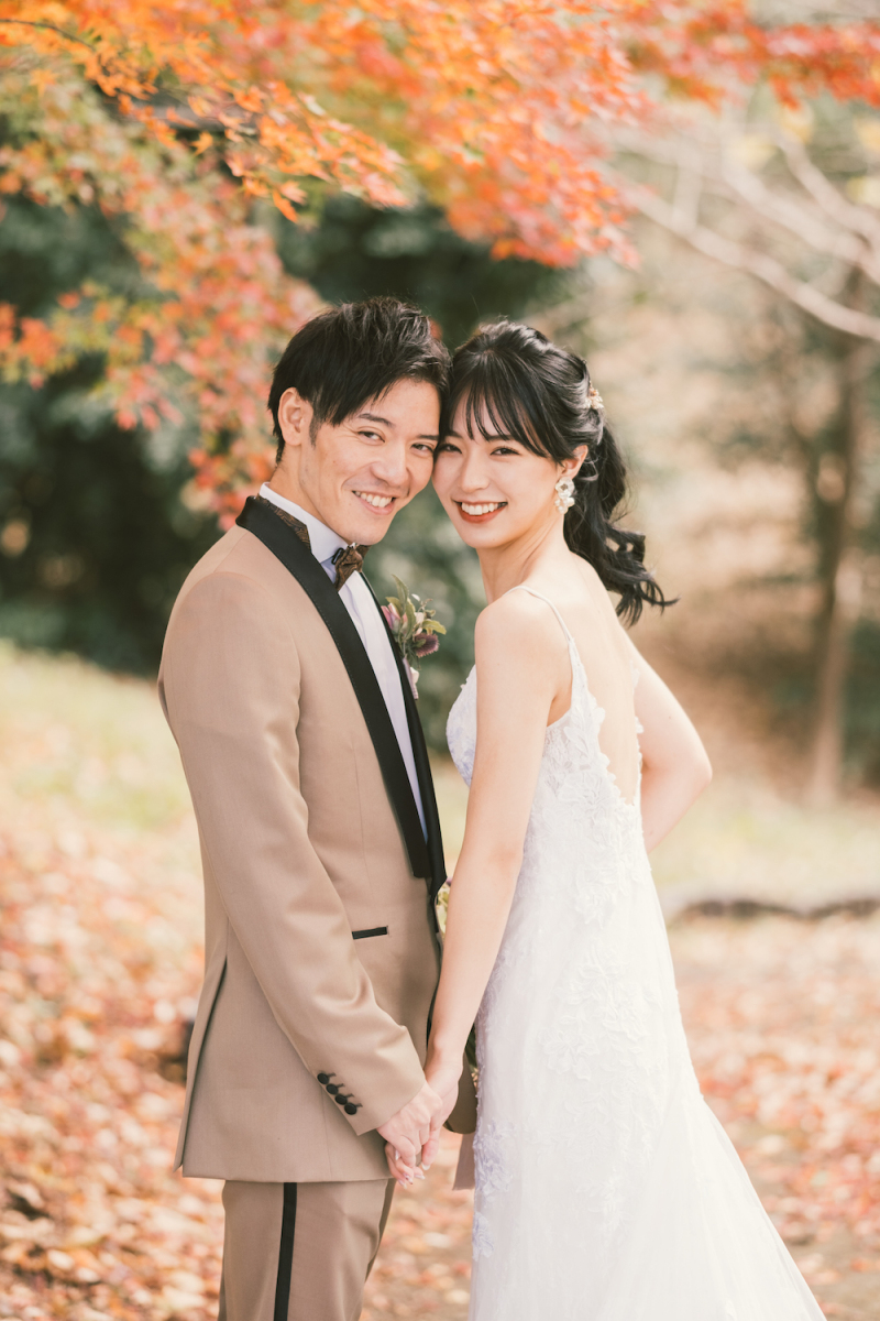 紅葉バックににっこり♪