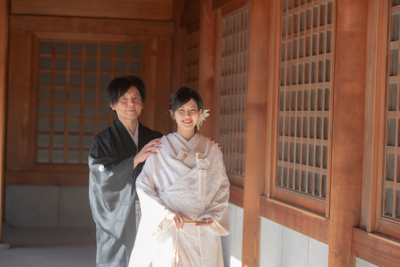 ご新郎卓也さまとご新婦景子さま笑顔で2ショット