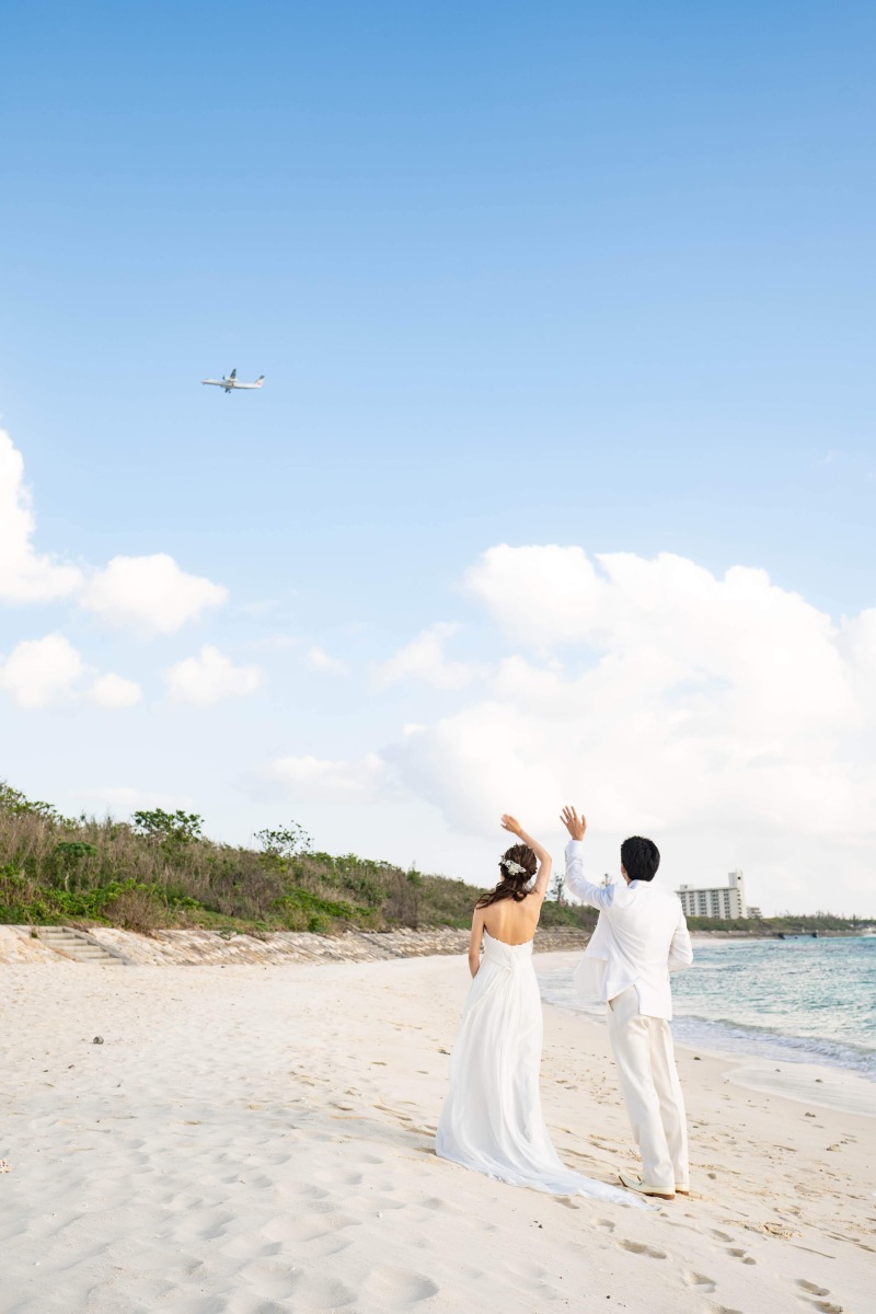 飛行機に手を振って
