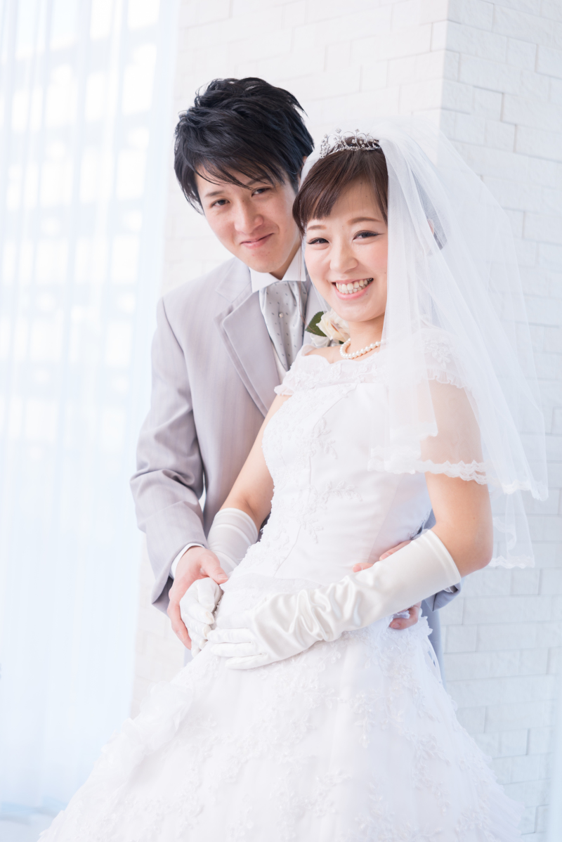 お腹に手をあてて