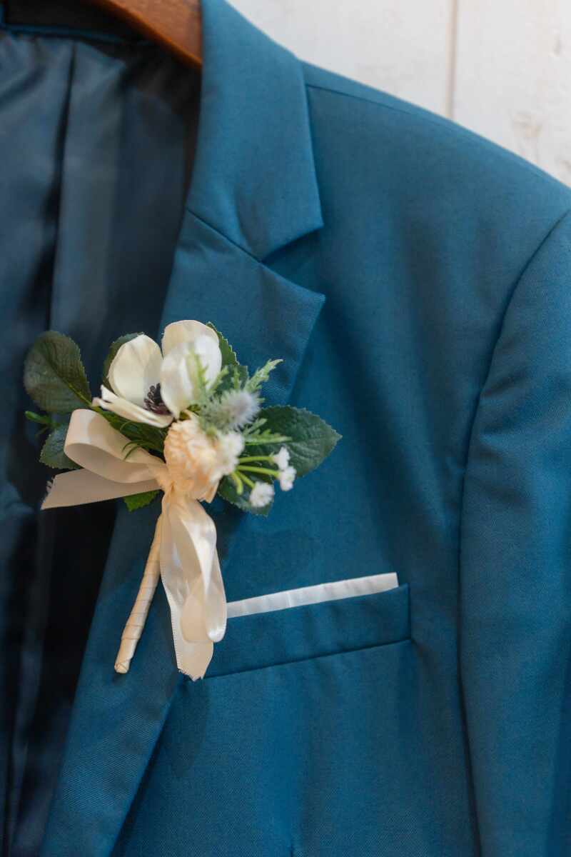 新郎様のブートニアは…