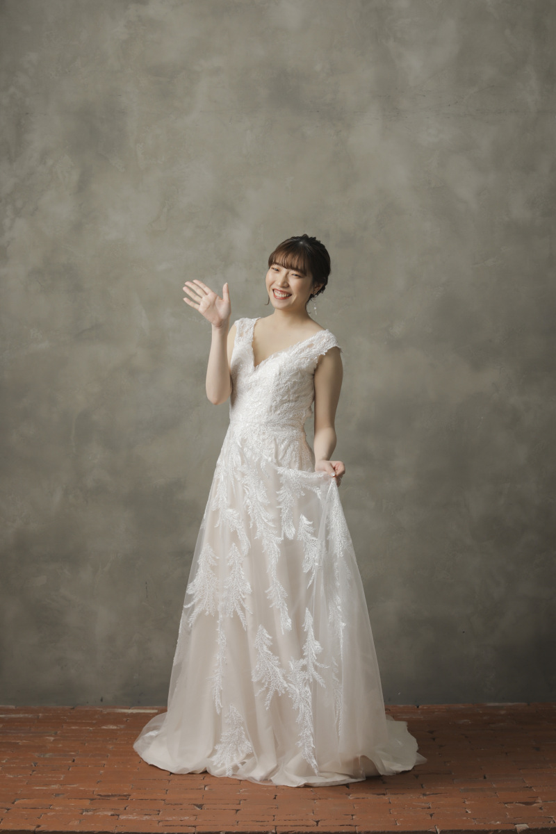 手を振る先には…