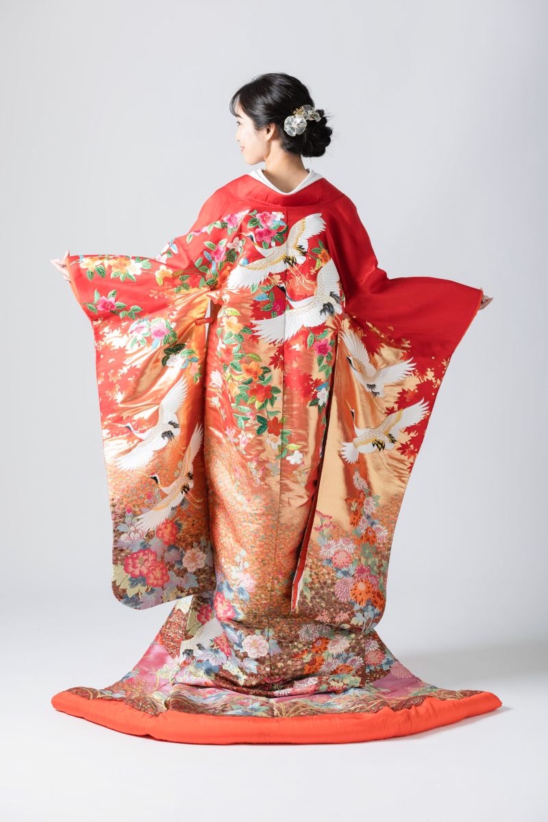 鶴に花流れ