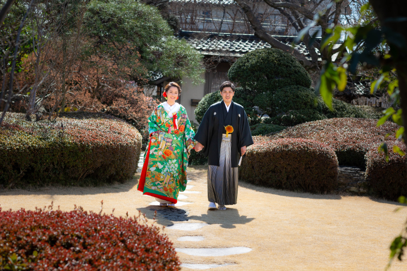 春間近の日本庭園で。