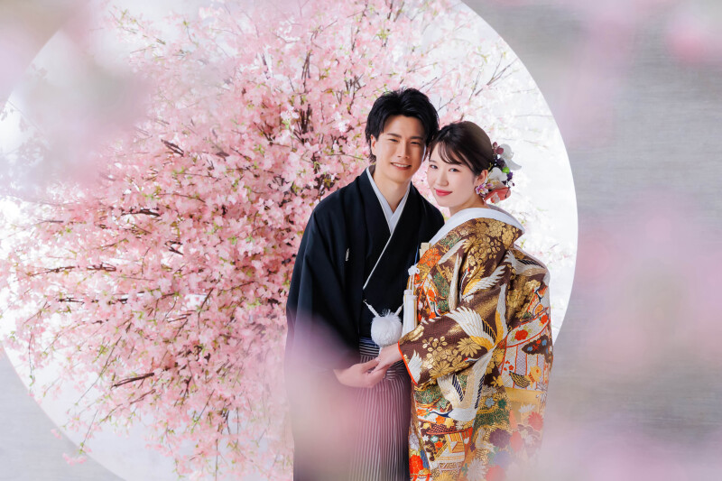 桜越しにそろう笑顔