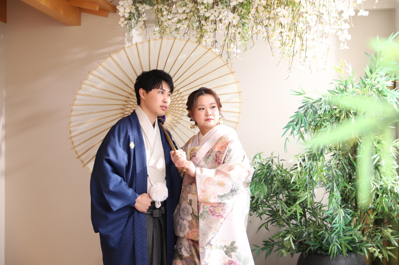 傘を持って
