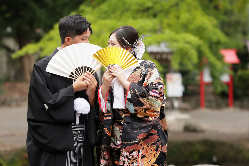 扇子でひそひそ