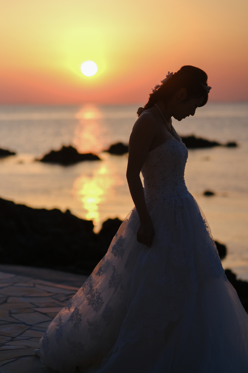 沈む夕日に包まれて