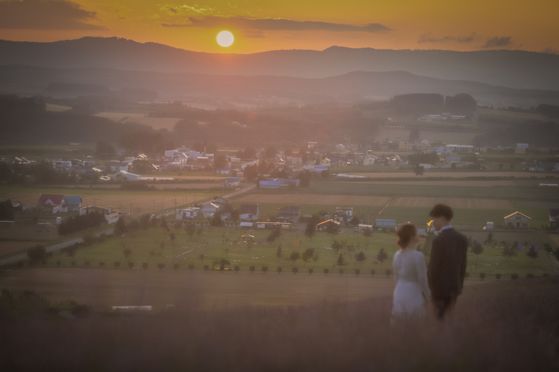 沈む夕日を見ながら