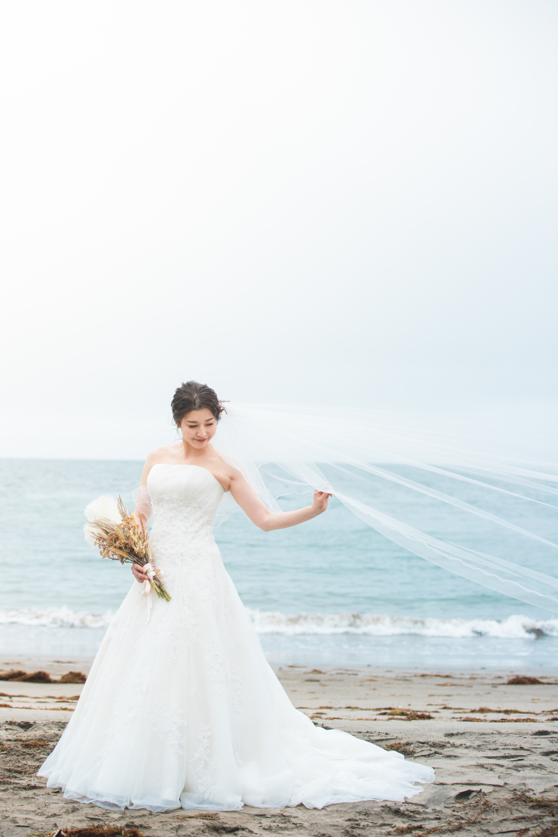 ベールをなびかせて