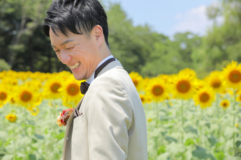 ご新郎様のクシャ笑顔。