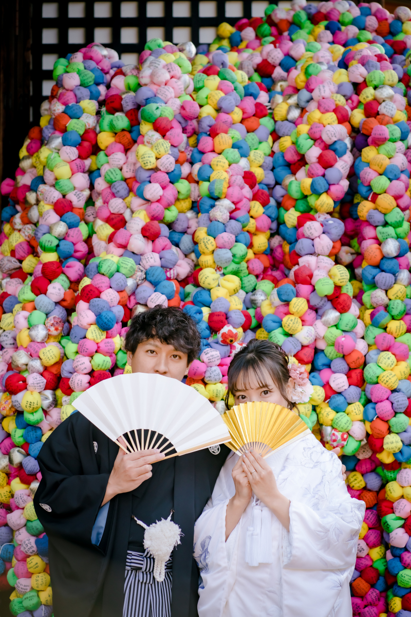 口元隠しショット