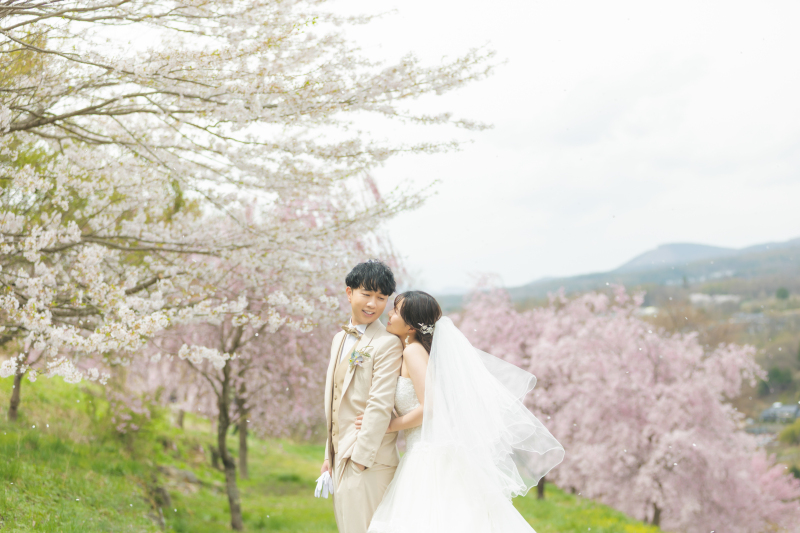 満開の桜を背景に飯綱山ロケーション!