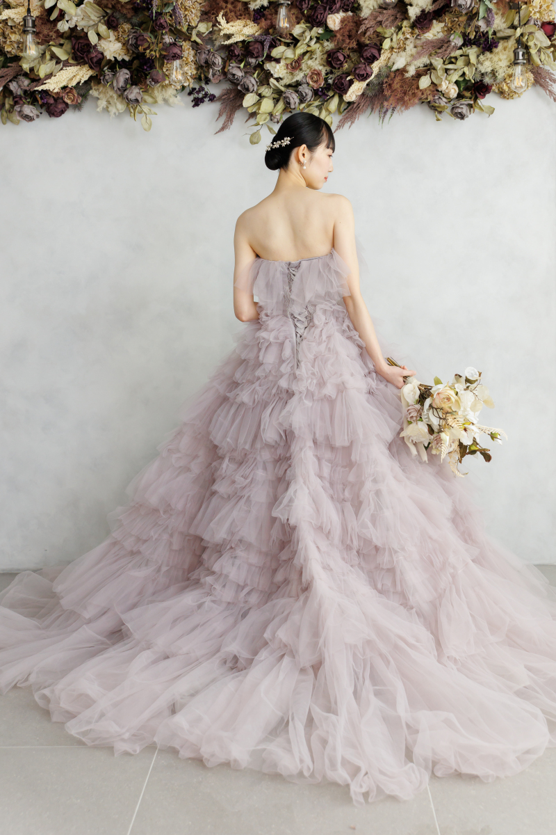 うしろ姿にふわり春色