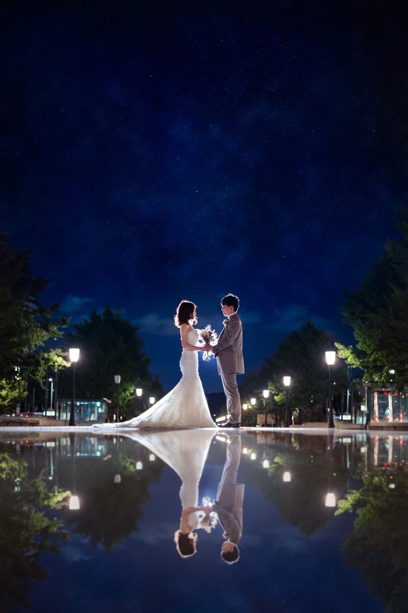 美しい夜空の下で東京駅・和田倉門・明治安田生命館ロケーション撮影