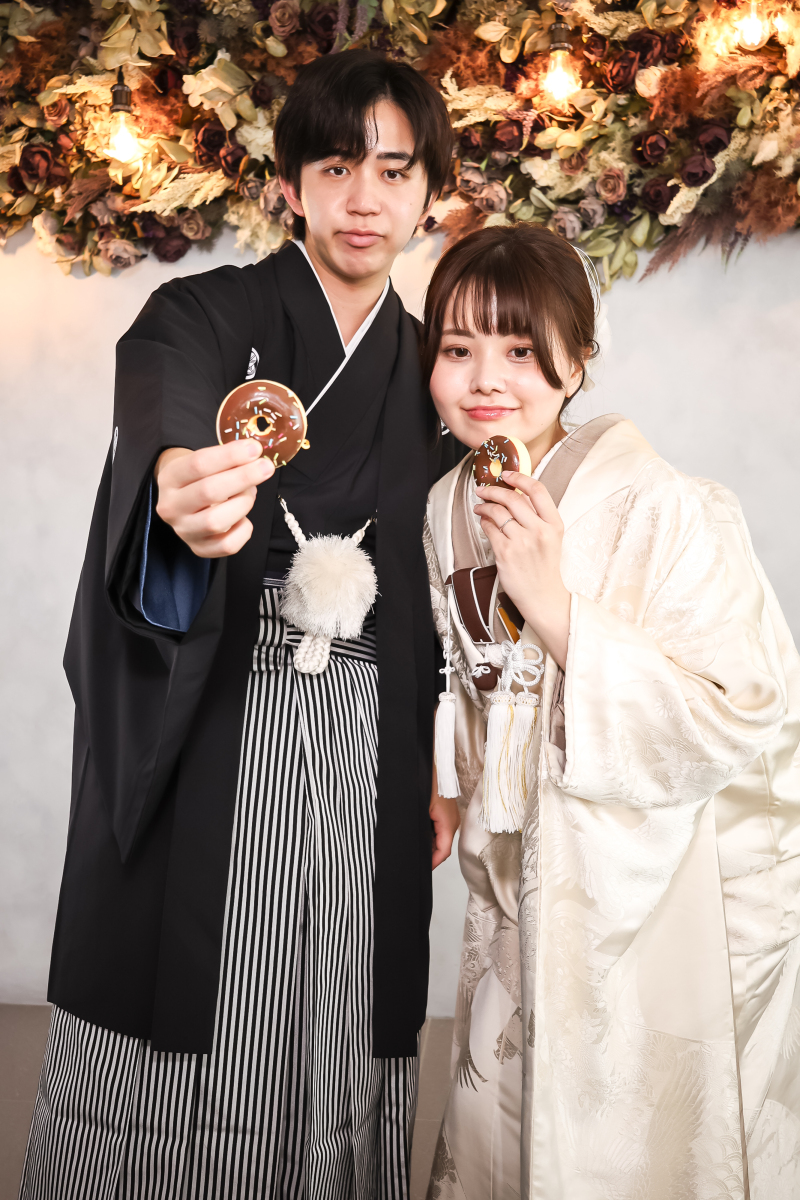 ドーナツ越しの笑顔