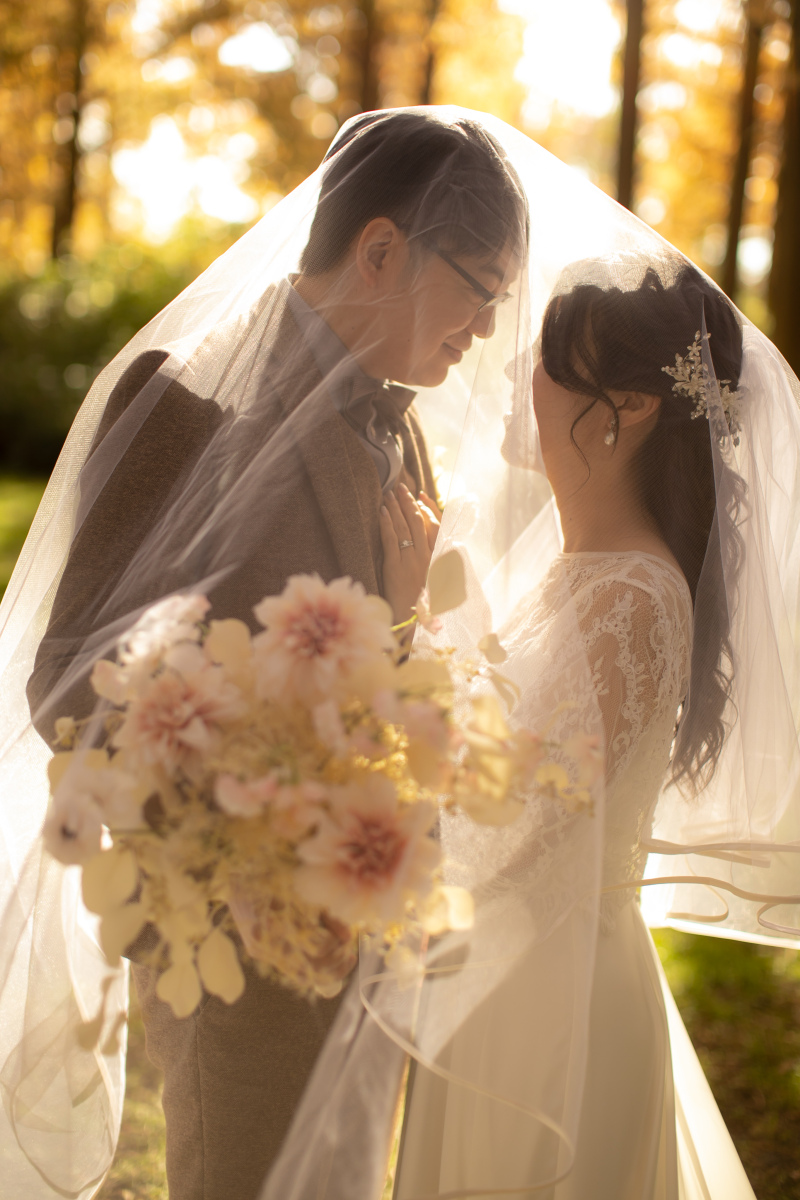 真っ白で大きなベールに包まれて