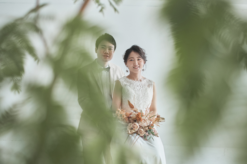 グリーンに囲まれた、自然な笑顔