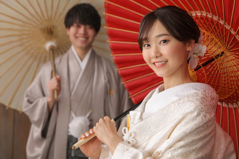 傘を持って