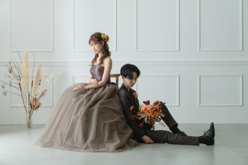 背中合わせで...