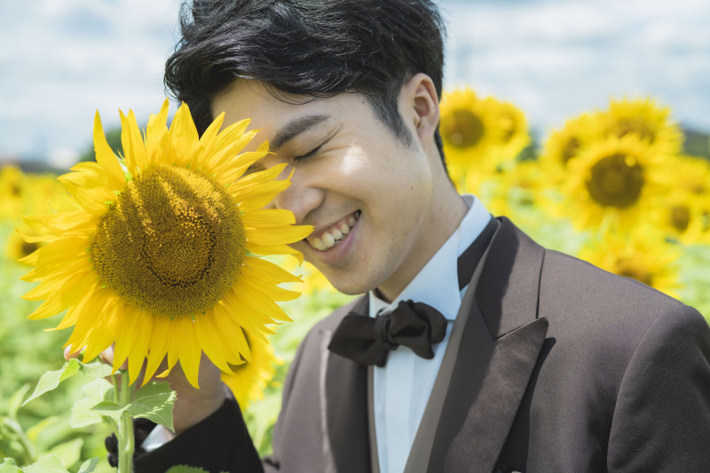 くっしゃとした笑顔